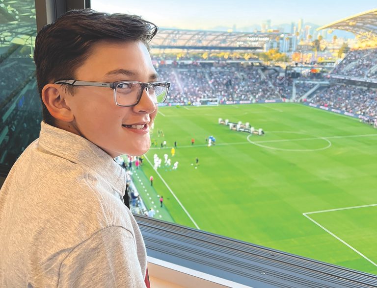 Youth reporter in the kick of things covering women’s soccer match